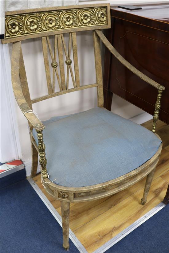 An 18th century style Italian gilt and cream painted metal elbow chair